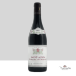Une bouteille de vin rouge de Saint-Aubin Premier Cru Les Champlots, Domaine Gilles Bouton et Fils